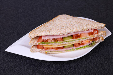 Club sandwich with ham and cheese