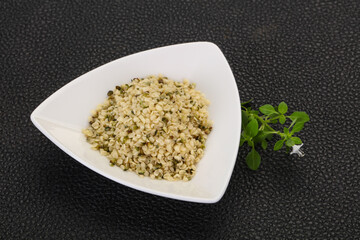Peeled hemp seeds in the bowl
