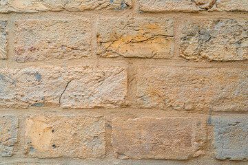 Rough brick wall, horizontal wallpaper/background. abstract close-up brick wall background..
