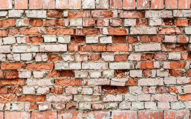 Texture of broken brick wall.