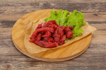 Raw beef meat sliced for cooking
