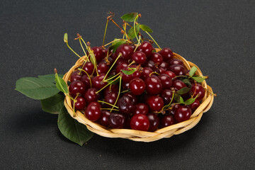 Sweet ripe cherry with leaves