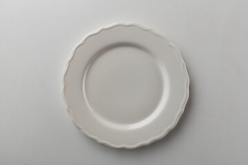 Top view shot of white circular plate.