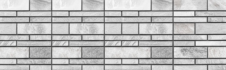 Panorama Block pattern of white stone cladding wall tile texture and seamless background