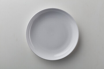 Top view shot of white circular plate.