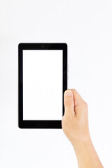 Right hand of a middle aged man holding a tablet computer in one hand.