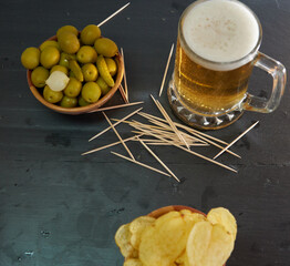 Beer and potatoes with olives