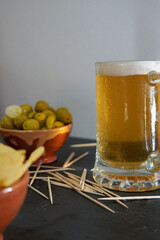 Beer and potatoes with olives