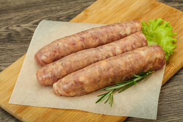 Raw pork meat sausages for grill