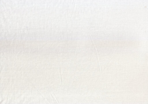 A white cotton fabric Background.