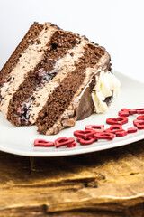 Chocolate cake frosting food dessert red hearts plate wood mousse cream