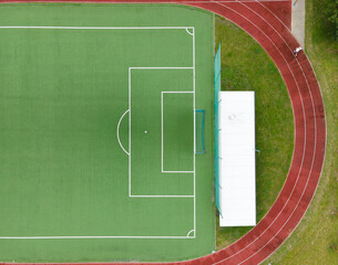 Empty stadium soccer field, top down view