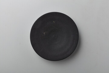 Top view shot of a plate on white background
