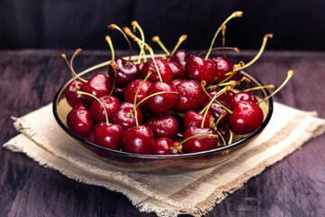 bowl of sweet cherries on a napkin