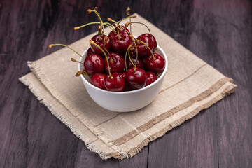 bowl of sweet cherries on a napkin