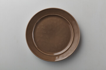 Top view shot of a plate on white background.