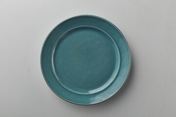 Top view shot of a plate on white background.