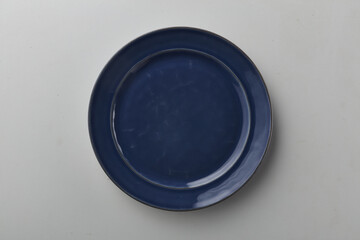 Top view shot of a plate on white background.
