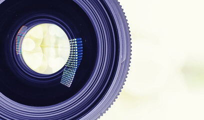 Equipment videographer and photographer. Lenses on the table against the background of bright...