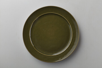 Top view shot of a plate on white background.