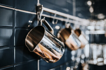 Interior and equipment of a professional bartender - coffee machine and barista dishes in a cafe