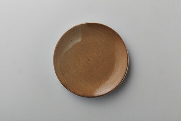 Top view shot of a plate on white background.