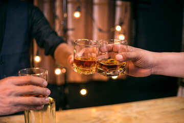 Celebrate whiskey on a friendly party in restaurant