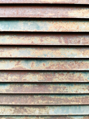 Old rusty iron slide door mesh for background