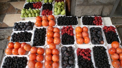 Assortment of fresh fruits and berries on the market. in Georgia 