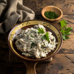 Homemade mushroom stew with cream and parsley
