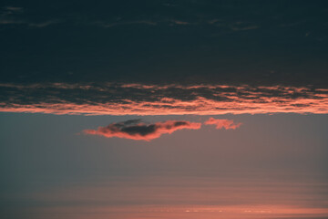 Dark evening sky, soft focus. Colorful cloudy sky at sunset. Sky texture, abstract nature background