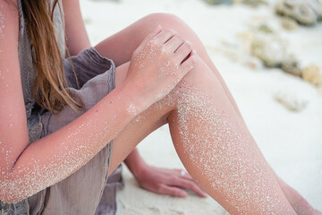 reddened skin of the feet from tanning in the sand