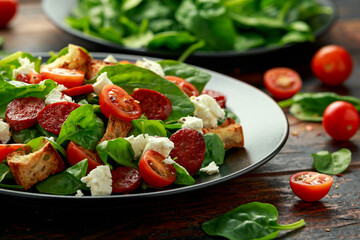 Chorizo Tomato salad with spinach, feta cheese and croutons. healthy summer food