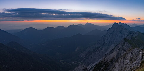 Panoramic morning view of the Kosuta ridge in Karavanke range alps before the sunrise, Slovenia