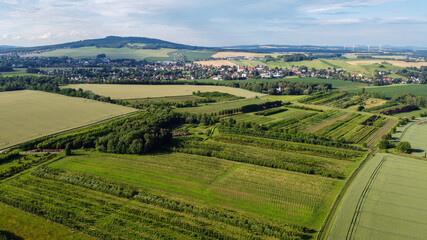 Fototapeta premium air view of Leutersdorf and the mountains nearby in saxony