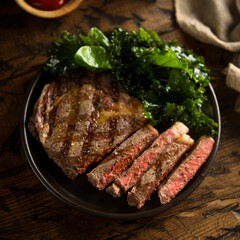 Grilled beef steak with tomato sauce