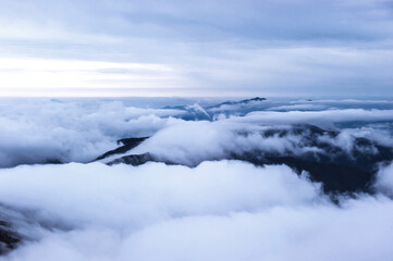 Obraz premium Beautiful sea of clouds at dawn on the top of the mountain.