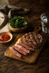 Grilled beef steak with tomato sauce