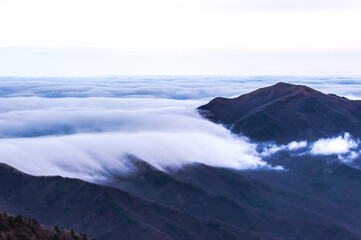 Beautiful sea of clouds at dawn on the top of the mountain.