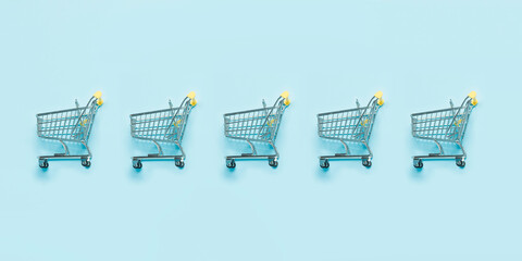 Pattern shopping trolley on a blue background.Sales and purchases concept