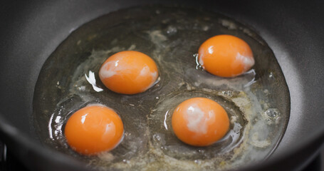 Crack egg on the grill pan