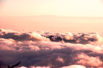 Obraz premium Beautiful sea of clouds at sunset on the top of the mountain.