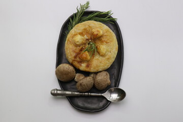 Chicken Pie on Black Plate 