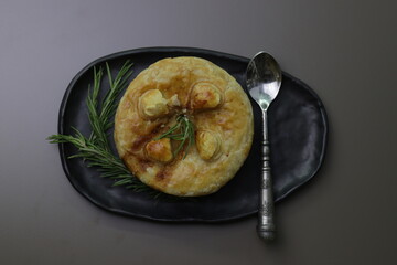 Top View of Chicken Pie on Light Brown  Background
