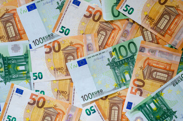 Background of many euro currency notes.