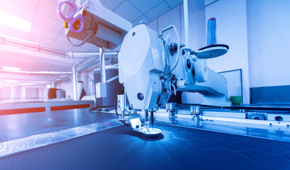 Fabric industry production line. Textile factory. Working tailoring process