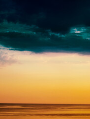 Naklejka na ściany i meble Dramatic Sunset sea horizon sky clouds sunset landscape. Nature sundown wallpaper