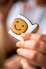 Smiley cookies in the hands