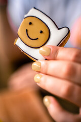 Smiley cookies in the hands