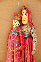 Fototapeta na wymiar A couple of traditional puppets with strings. shot at Kutch in Gujarat on 19 feb 2019